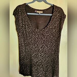 Jennifer Lopez Black sleeveless top with sliver threading